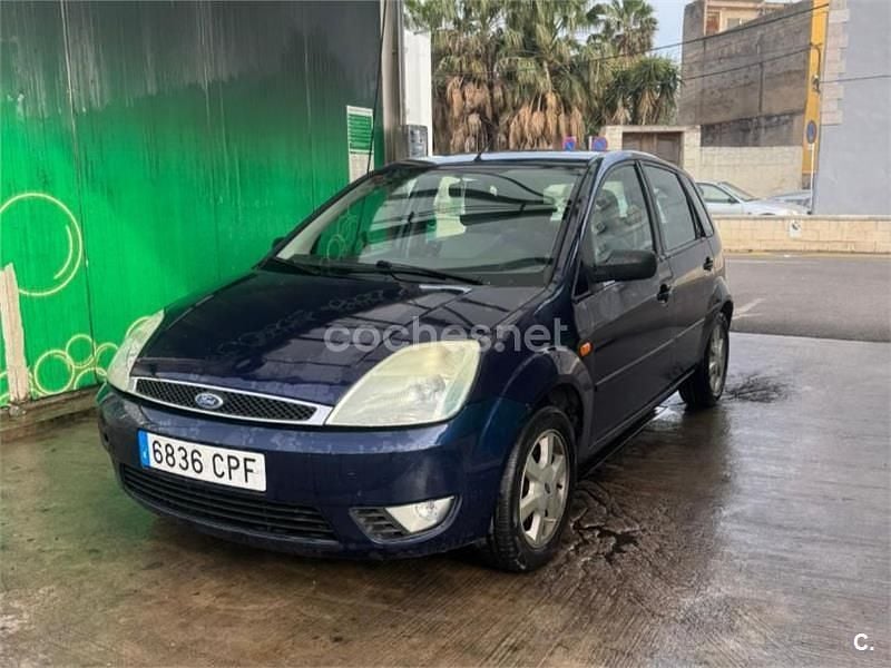 Usado Ford Fiesta Ghia 68 CV (50 kW) 2003 Negro Utilitario