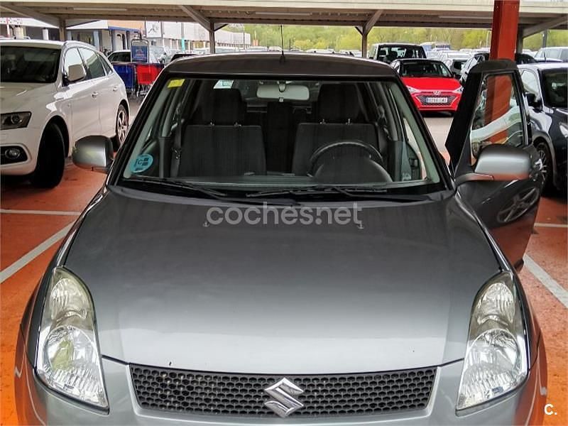 Usado Suzuki Swift GL 92 CV (67 kW) 2007 Gris / plata Utilitario