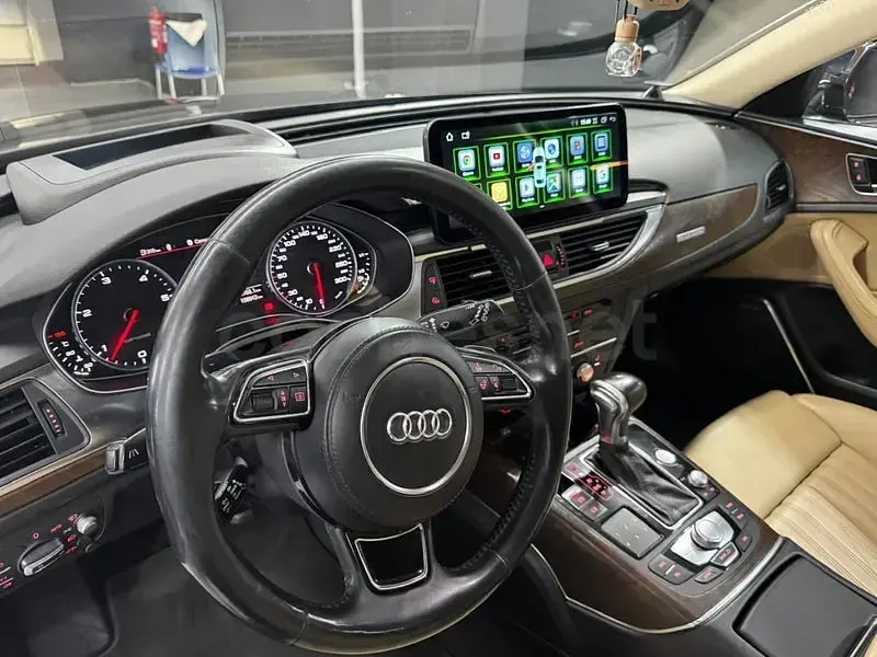 Usado Audi A6 Premium 313 CV (230 kW) 2013 Marrón Familiar