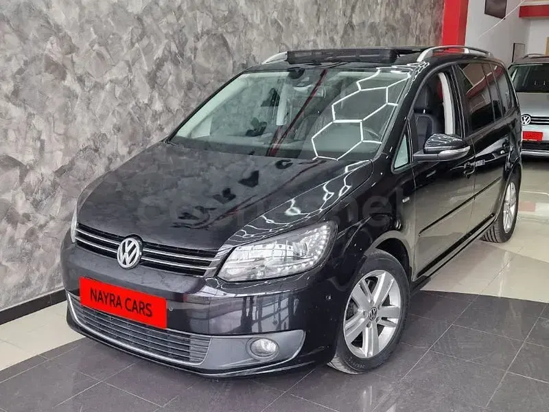 Usado VW Touran Sport 140 CV (102 kW) 2012 Negro Monovolumen