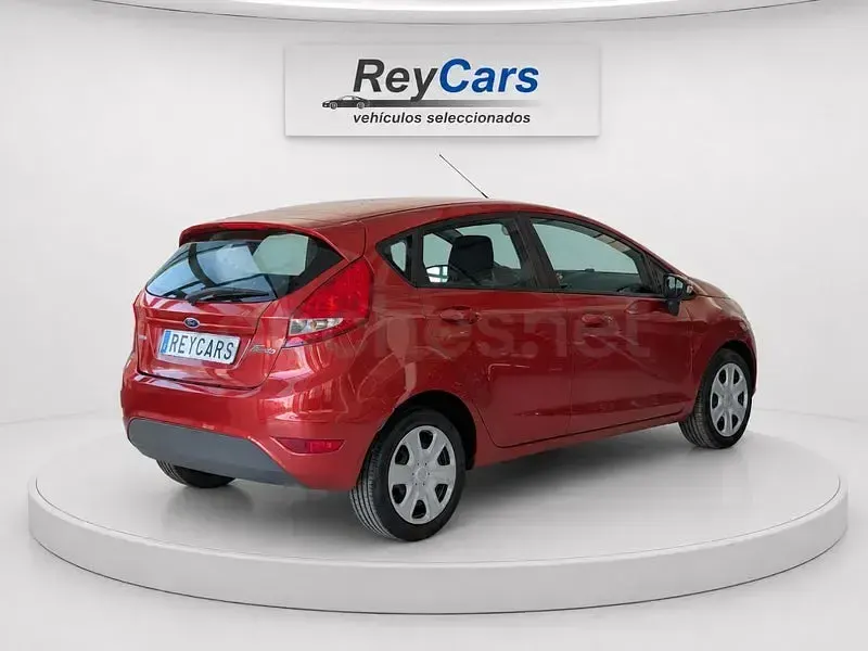 Usado Ford Fiesta Trend 68 CV (50 kW) 2009 Rojo Utilitario