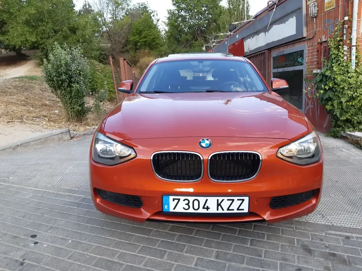 Usado BMW 118 143 CV (105 kW) 2012 Rojo Utilitario