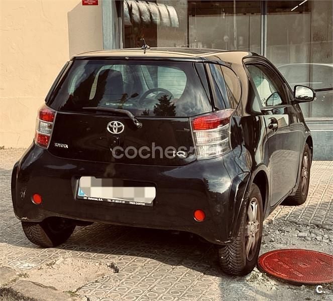 Usado Toyota iQ 68 CV (50 kW) 2009 Negro Utilitario