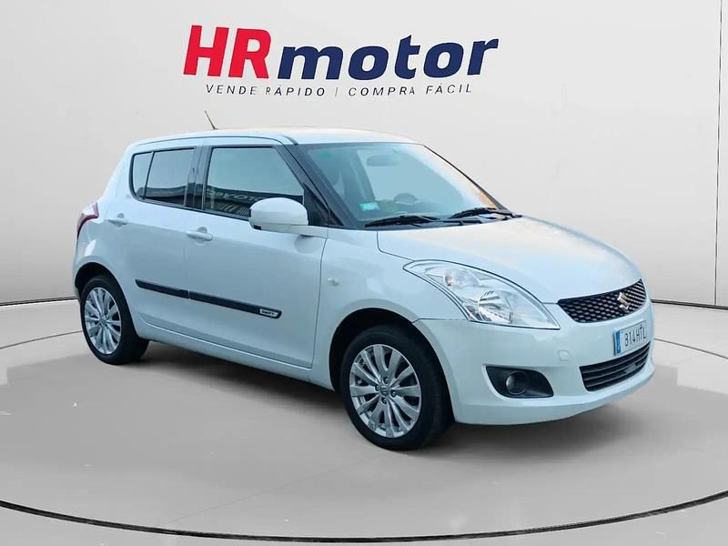 Blanco Usado 2013 Suzuki Swift GLX Utilitario | 9820 € (Precio justo) - Imagen 1/4