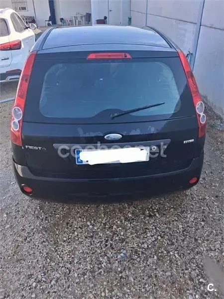Usado Ford Fiesta Ghia 80 CV (58 kW) 2007 Negro Utilitario