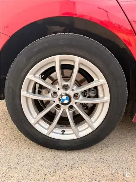 Usado BMW 116 122 CV (89 kW) 2012 Rojo Utilitario