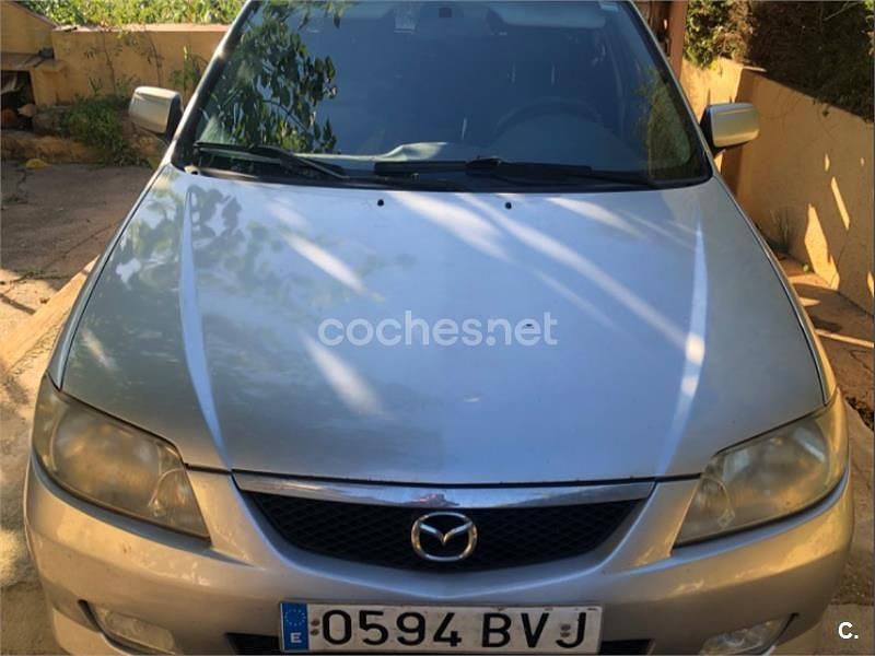 Usado Mazda 323 Comfort 100 CV (73 kW) 2002 Gris / plata Berlina