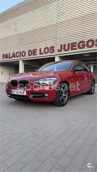 Rojo Usado 2012 BMW 118 Sport Line Utilitario | 11.200 € (Precio justo) - Imagen 1/4