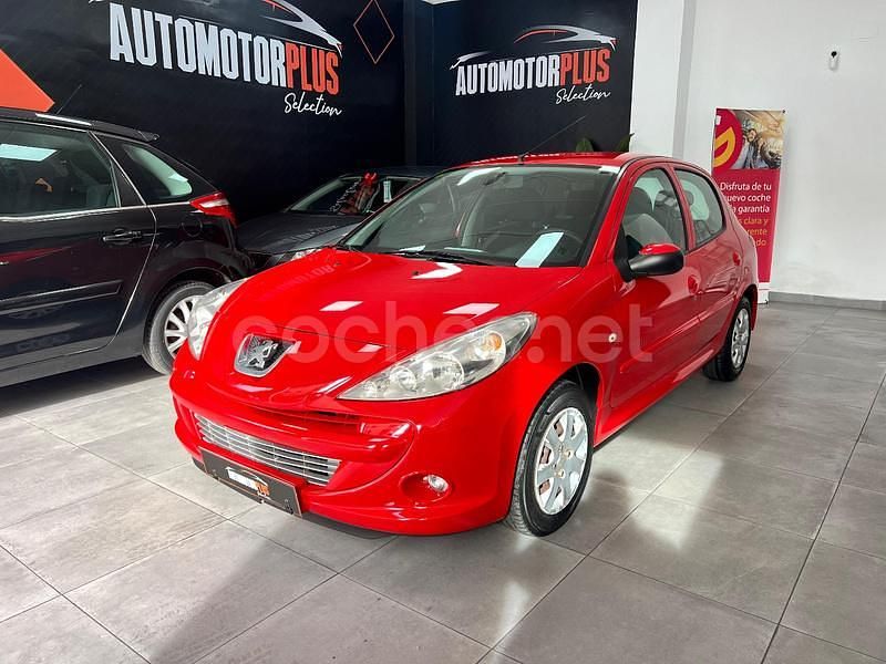 Usado Peugeot 206 60 CV (44 kW) 2009 Rojo Berlina