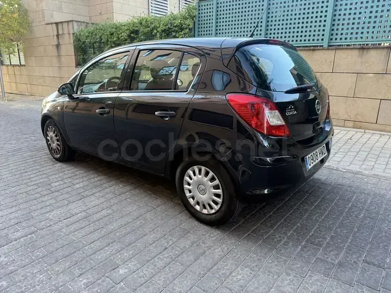 Usado Opel Corsa Selective 75 CV (55 kW) 2012 Negro Utilitario