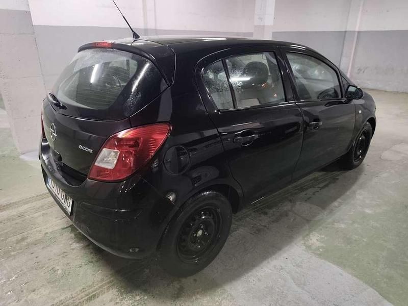 Usado Opel Corsa 75 CV (55 kW) 2010 Negro Utilitario