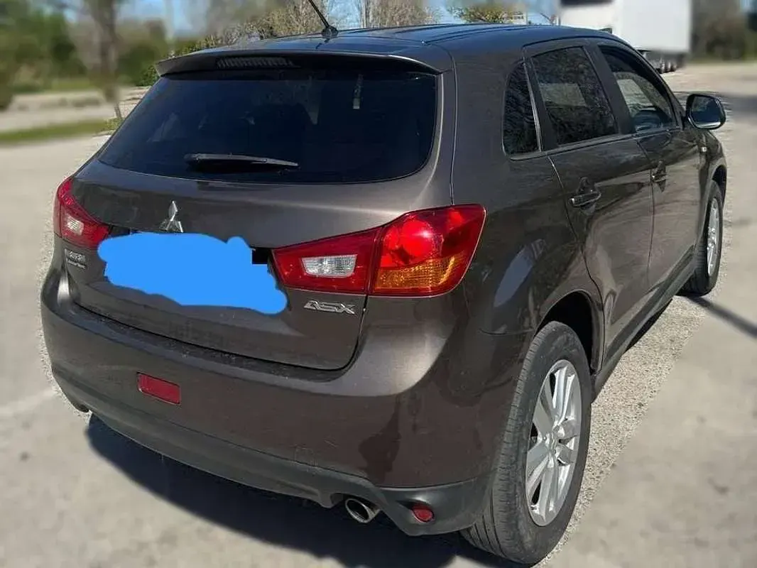 Usado Mitsubishi ASX 116 CV (85 kW) 2014 Marrón SUV