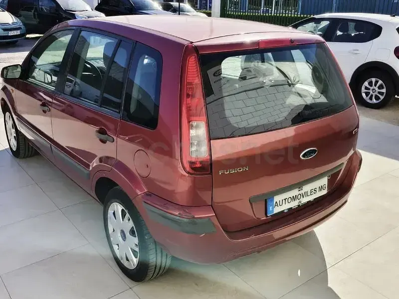 Usado Ford Fusion Ambiente 68 CV (50 kW) 2008 Naranja Utilitario