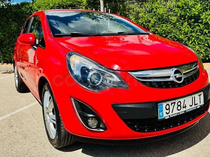 Usado Opel Corsa Selective 95 CV (69 kW) 2013 Rojo Utilitario