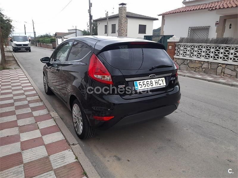 Usado Ford Fiesta Titanium 95 CV (69 kW) 2011 Negro Berlina
