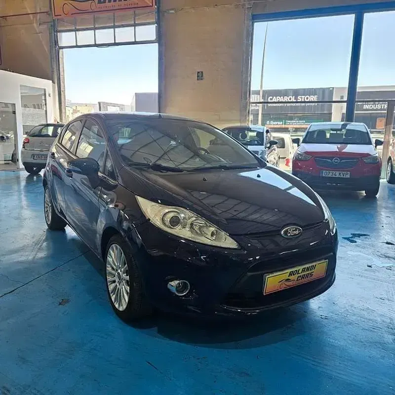 Usado Ford Fiesta Titanium 97 CV (71 kW) 2011 Azul Utilitario