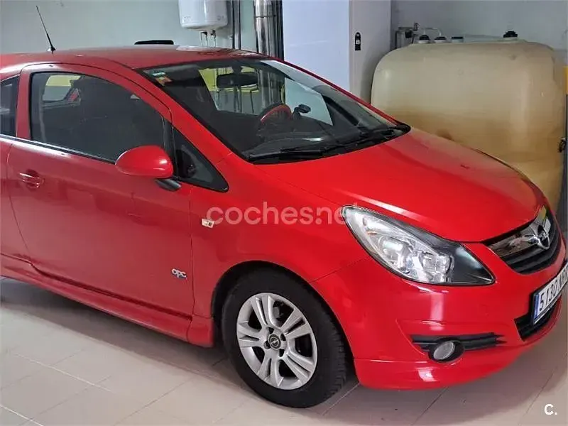 Usado Opel Corsa 90 CV (66 kW) 2009 Rojo Utilitario