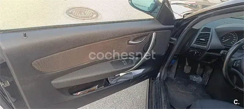 Usado BMW 118 143 CV (105 kW) 2007 Negro Utilitario