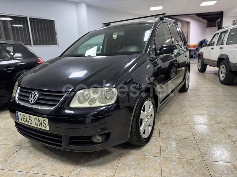 Usado VW Touran Highline 140 CV (102 kW) 2003 Negro Monovolumen