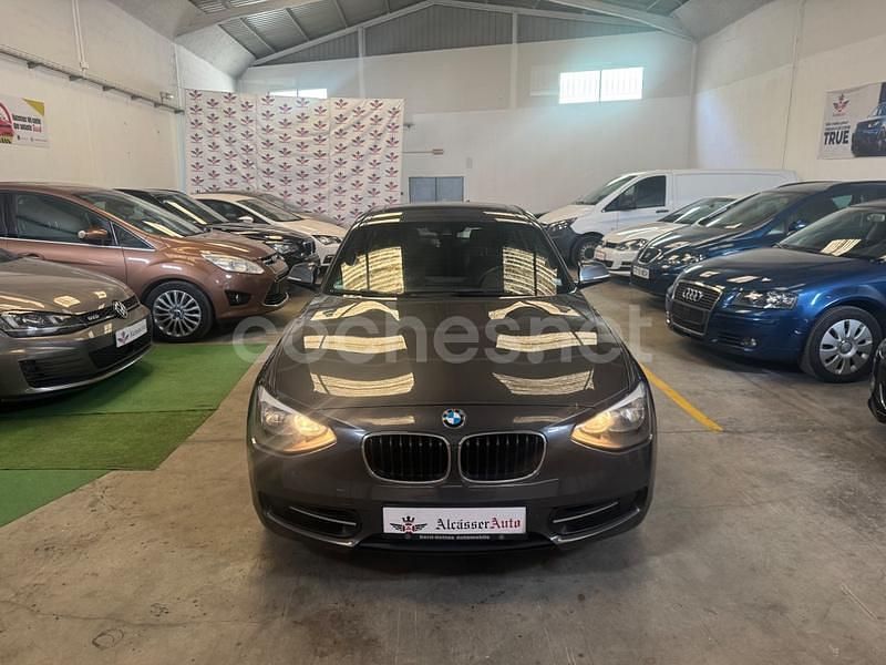Negro Usado 2012 BMW 118 Utilitario | 9690 € (Precio justo) - Imagen 1/4