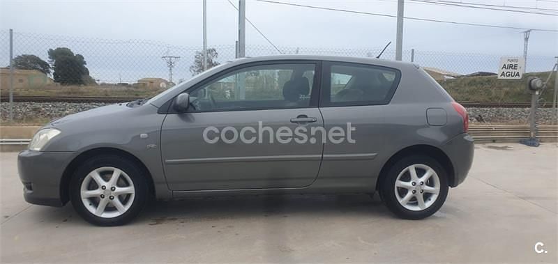 Usado Toyota Corolla Sol 90 CV (66 kW) 2004 Gris / plata Berlina