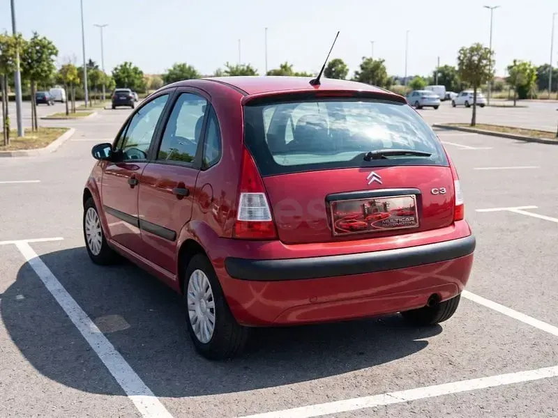 Usado Citroën C3 Furio 61 CV (44 kW) 2007 Granate Berlina