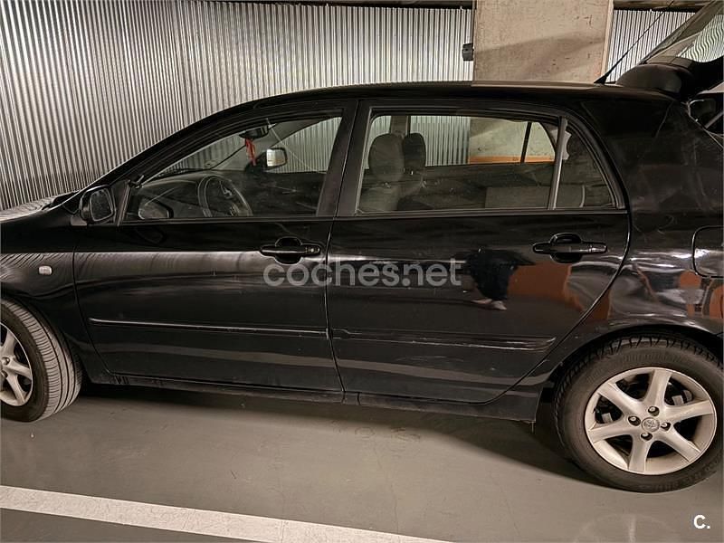 Usado Toyota Corolla Sol 116 CV (85 kW) 2005 Negro Berlina