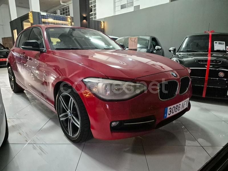 Rojo Usado 2012 BMW 118 Sport Line Utilitario | 10.500 € (Caro) - Imagen 1/4