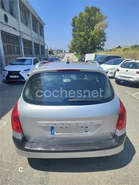 Usado Peugeot 308 90 CV (66 kW) 2010 Gris / plata Berlina