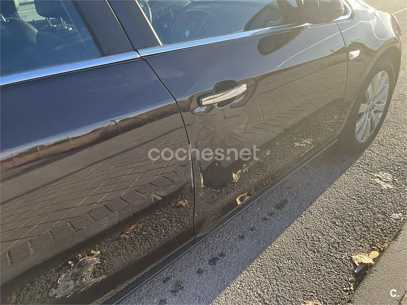 Usado Opel Astra Excellence 130 CV (95 kW) 2013 Marrón Berlina