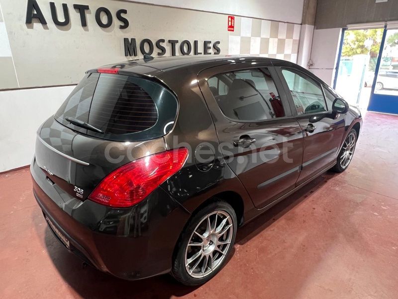 Usado Peugeot 308 Access 112 CV (82 kW) 2012 Marrón Berlina