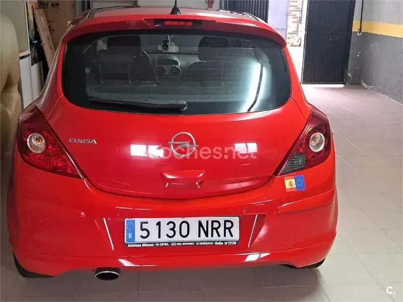 Usado Opel Corsa 90 CV (66 kW) 2009 Rojo Utilitario