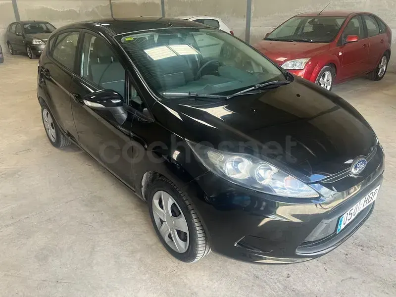 Usado Ford Fiesta Trend 70 CV (51 kW) 2011 Negro Berlina