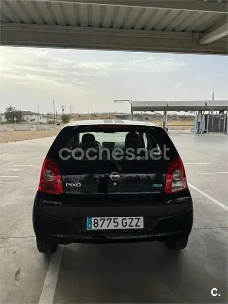 Usado Nissan Pixo Acenta 68 CV (50 kW) 2010 Negro Utilitario