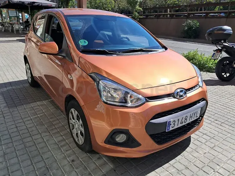 Usado Hyundai i10 66 CV (48 kW) 2014 Naranja Utilitario