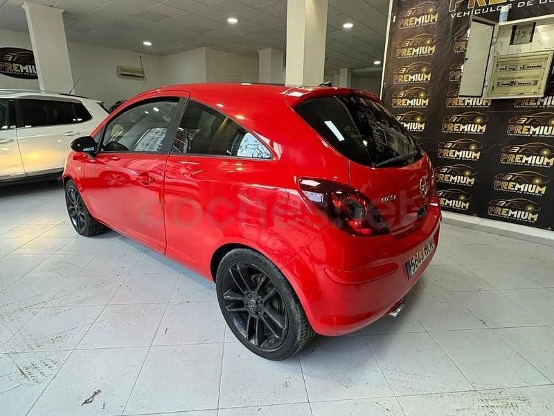 Usado Opel Corsa Selective 95 CV (69 kW) 2012 Rojo Utilitario