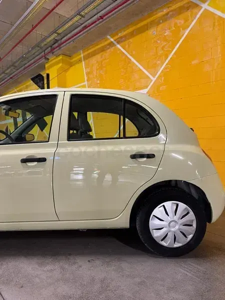 Używany Nissan Micra Visia+ 80 KM (58 kW) 2006 Żółty Sedan/Limuzyna