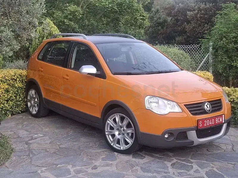 Usado VW Polo Cross 105 CV (77 kW) 2006 Naranja Utilitario