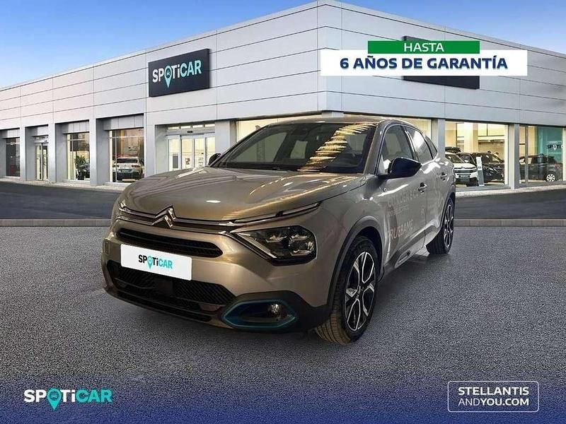 Gris Usado 2024 Citroën e-C4 Feel Berlina | 20.990 € (Un poco caro) - Imagen 1/4