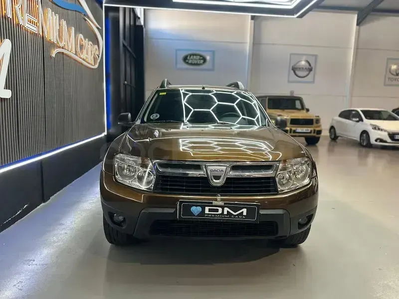 Usado Dacia Duster Ambiance 107 CV (78 kW) 2010 Marrón SUV