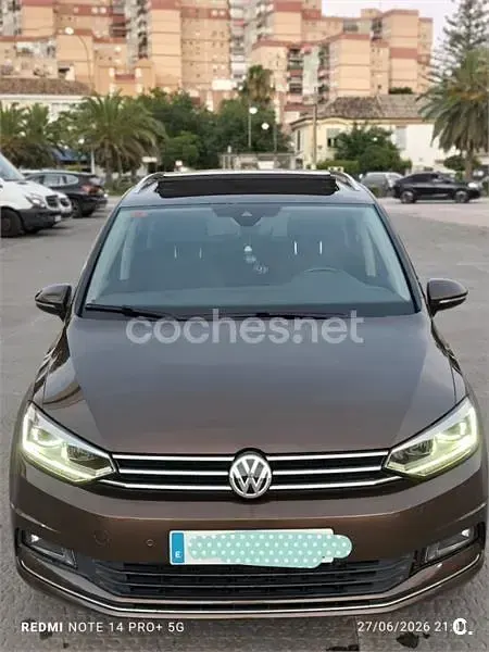 Usado VW Touran Advance 150 CV (110 kW) 2016 Granate Monovolumen