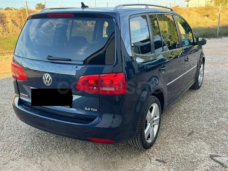 Usado VW Touran Advance 140 CV (102 kW) 2014 Azul Monovolumen