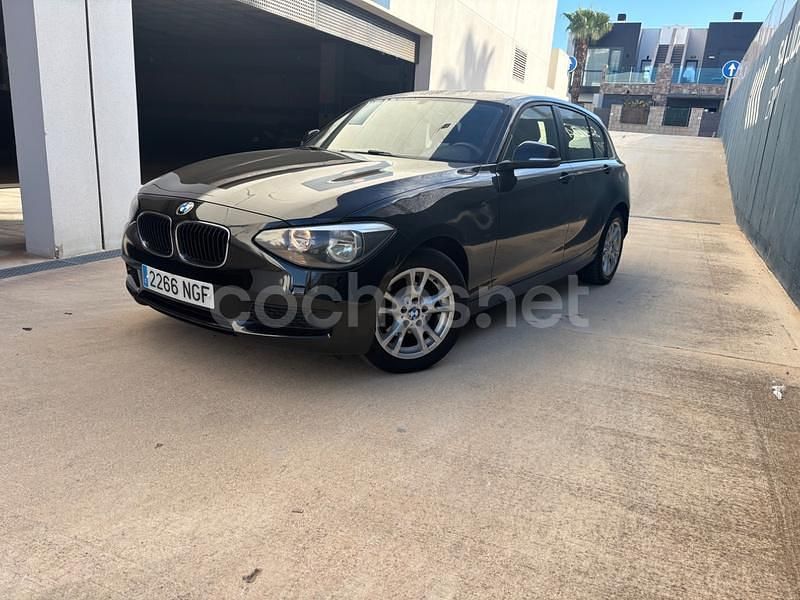 Negro Usado 2012 BMW 116 Comfort Edition Utilitario | 7999 € (Buen precio) - Imagen 1/4