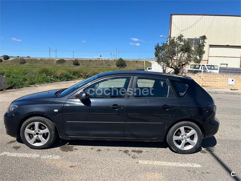 Usado Mazda 3 Active 110 CV (80 kW) 2004 Negro Berlina