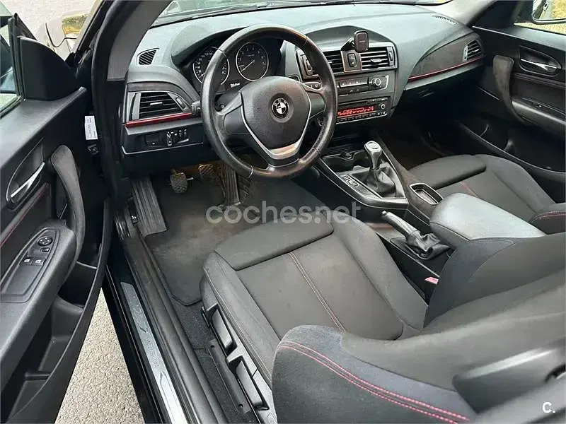 Usado BMW 116 Sport Line 122 CV (89 kW) 2013 Negro Utilitario