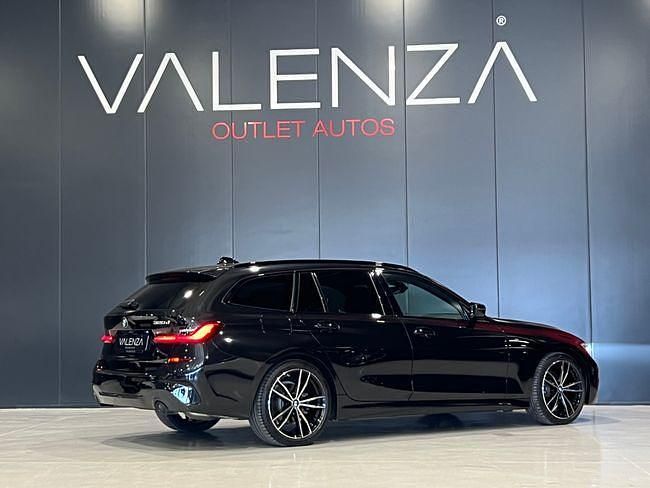 Usado BMW 320e 190 CV (139 kW) 2021 Negro Familiar