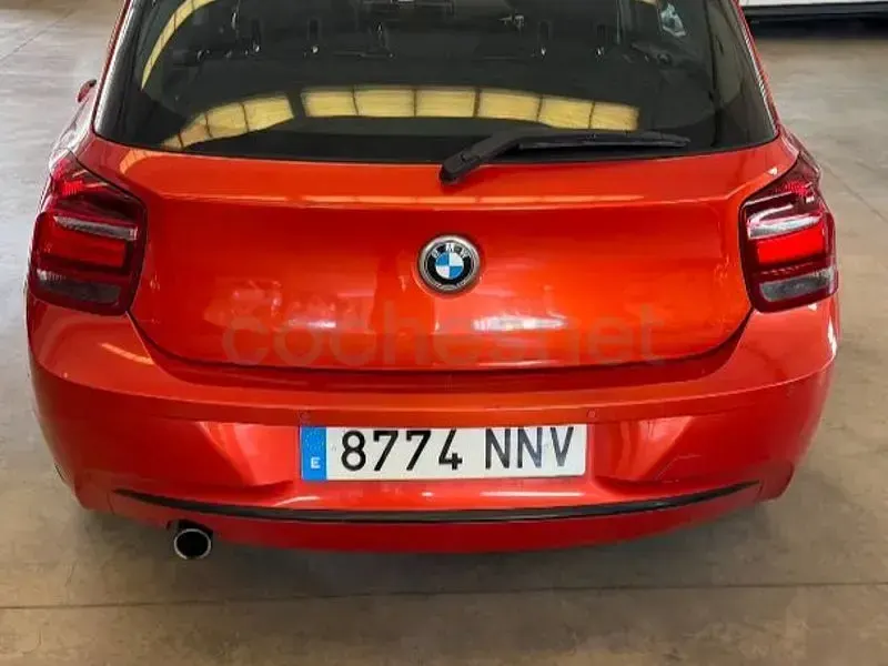 Usado BMW 116 Sport Line 136 CV (100 kW) 2012 Naranja Utilitario