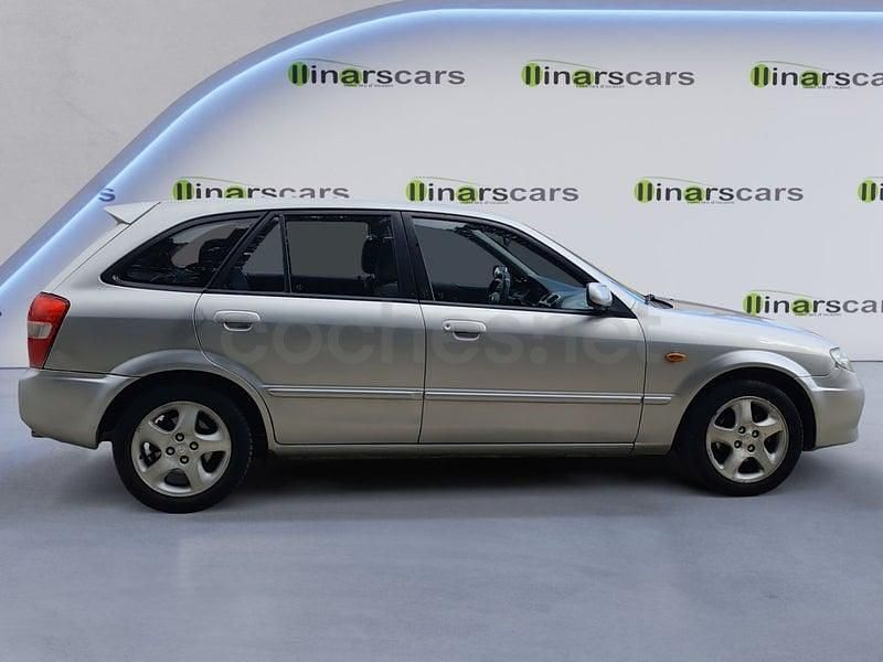 Usado Mazda 323 Comfort 100 CV (73 kW) 2002 Gris / plata Berlina