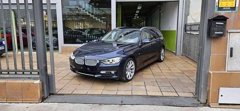 Negro Usado 2014 BMW 320 Sport Line Familiar | 11.990 € (Precio justo) - Imagen 1/4