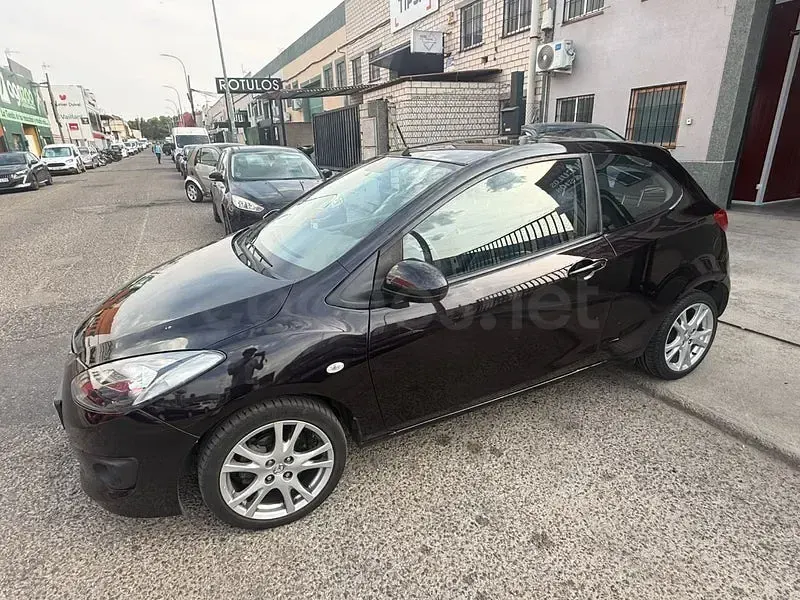 Usado Mazda 2 Active 90 CV (66 kW) 2010 Marrón Utilitario